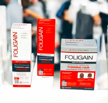 แชมพู ครีมนวดผม และผลิตภัณฑ์บำรุงชนิดทา TRIOXIDIL FOLIGAIN สำหรับผู้ชายในกล่องสีส้มและสีขาว.