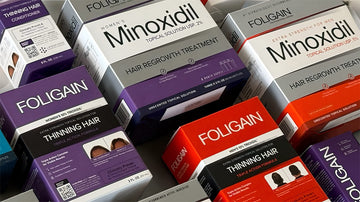 ผลิตภัณฑ์ดูแลเส้นผมไมน็อกซิดิลและ TRIOXIDIL FOLIGAIN หลากชนิดในกล่อง.